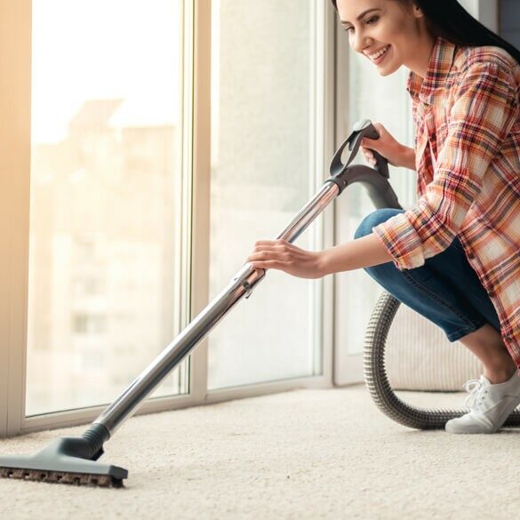 Woman clean carpet | Cherry City Interiors